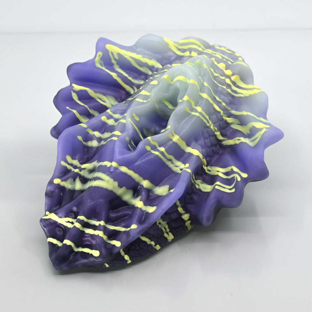 C4MDU76 Calypso Large 0050 UV GITD