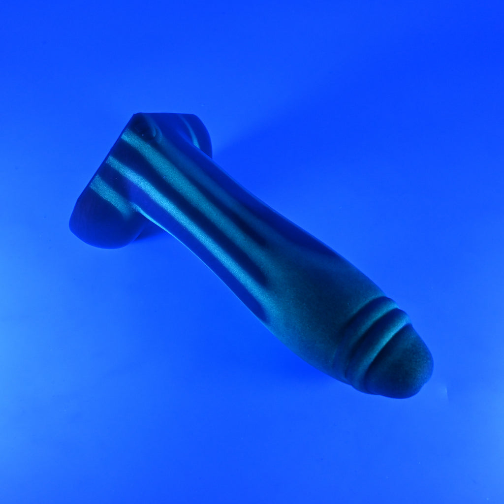 Q3SKP65 Aquus Medium 0030 UV GITD